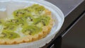 Pie with kiwi and berries. Sweet dessert with kiwi and berries, pastry with fruit.