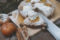 Pie with persimmon on the cutting Board, fresh persimmon, knife, cinnamon, spruce branches Royalty Free Stock Photo