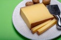 Piece of aged Comte or Gruyere de Comte, AOC French cheese made Royalty Free Stock Photo