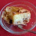 Piece of apple cake in a glass bowl