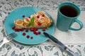 Piece of Apple pie with roses and tea Royalty Free Stock Photo