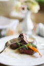 A piece of beef steak on a fork Royalty Free Stock Photo