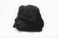 A piece of black coal on white background Royalty Free Stock Photo