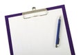 A piece of blank paper and pen on clipboard closeup Royalty Free Stock Photo