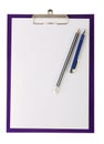 A piece of blank paper, pen and wooden pencil on clipboard Royalty Free Stock Photo