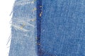 Piece of blue jeans fabric with ripped of back pocket Royalty Free Stock Photo