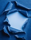 a piece of blue jeans material torn in the middle for text Royalty Free Stock Photo
