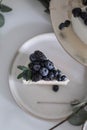 A piece of blueberry and blueberry pie on the table Royalty Free Stock Photo