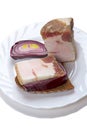 Piece of brackish bacon on rye bread and a red onion Royalty Free Stock Photo