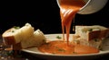 A piece of bread making a satisfying splash in tomato bisque Royalty Free Stock Photo