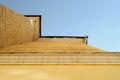 Piece of brick house wall with clear sky on the background Royalty Free Stock Photo