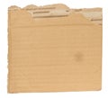 Piece of brown cardboard with torn edges on isolated background Royalty Free Stock Photo