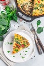 Piece of brunch egg frittata with vegetables on plate, vertical, top view Royalty Free Stock Photo