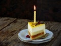 Piece of cake and candle burning. Niigata cake. Copy space.