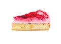 Piece of cake with delicate souffle, covered with strawberry jelly and coconut shaving