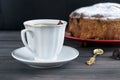 Piece of cake with fruit andcup of tea with lemon Royalty Free Stock Photo