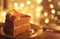 a piece of cake on top of lighted birthday cake birthday cake