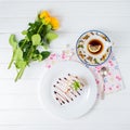 A piece of cake, white cup of tea and strawberries. Royalty Free Stock Photo