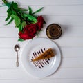 A piece of cake, white cup of tea and strawberries. Selective focus Royalty Free Stock Photo