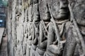 Fragment of Cambodian wall in Angkor Wat Royalty Free Stock Photo