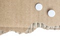 Piece of cardboard with punch holes