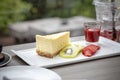 Piece of cheese cake decorated with kiwi fruit fand slice of strawberry ready to eat Royalty Free Stock Photo