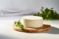 Piece of cheese on wooden plate with sprig of green. Generative AI