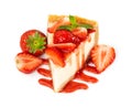 Piece of cheesecake with fresh strawberries and mint