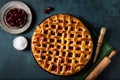 Piece of Cherry Pie with a Flaky Crust on dark background. Top view. American pie. Cherry dessert. Flatlay. Cherry