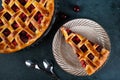 Piece of Cherry Pie with a Flaky Crust on dark background. Top view. American pie. Cherry dessert. Flatlay. Cherry