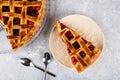 Piece of Cherry Pie with a Flaky Crust on light background. Top view. American pie. Cherry dessert. Flatlay. Cherry