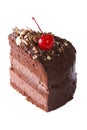 Piece chocolate cake with cherry closeup isolated on white Royalty Free Stock Photo