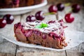 A piece of chocolate cake Clafoutis with cherries Royalty Free Stock Photo