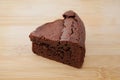 Piece of chocolate cake gateau chocola on cutting board Royalty Free Stock Photo