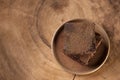 Piece of chocolate cake in a wood table. Royalty Free Stock Photo