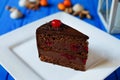 Piece of chocolate cherry cake close-up. Sweet tasty dessert sli Royalty Free Stock Photo