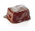 Piece of chocolate covered with melted chocolate Royalty Free Stock Photo
