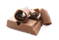 Piece of chocolate and curls on white background Royalty Free Stock Photo