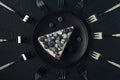 A piece of cottage cheese casserole and twelve dessert forks on dark textured background. Flat lay