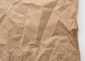 Piece of crumpled blank sheet of brown wrapping paper