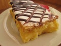 Custard Slice With Chocolate Webbing.