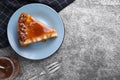 Piece of delicious cake with caramel served on table, flat lay. Space for text Royalty Free Stock Photo