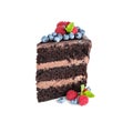 Piece of delicious chocolate cake decorated with fresh berries on white background Royalty Free Stock Photo