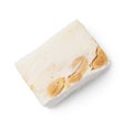 Piece of delicious nougat on white background, top view