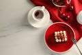Piece of delicious red velvet cake served on white marble table, flat lay. Space for text Royalty Free Stock Photo