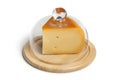 Piece of Dutch Gouda cheese covered with a glass hood Royalty Free Stock Photo