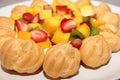 Piece of Eclair Cream Custard and fresh fruit Royalty Free Stock Photo