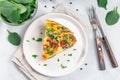 Piece of egg frittata with spinach, roasted peppers, mushrooms, cheese, horizontal, top view Royalty Free Stock Photo