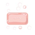 A piece of fragrant pink soap on a white background