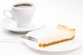 Piece of fresh baked cheesecake with cup of espesso coffee Royalty Free Stock Photo